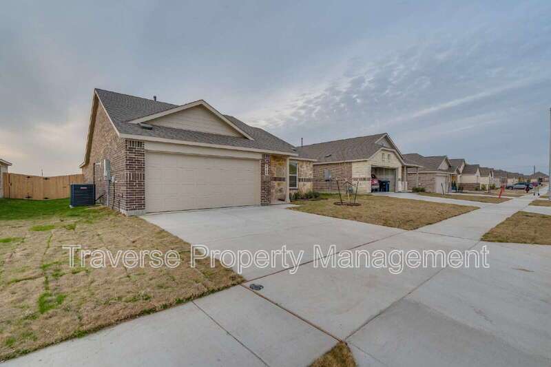 Be the first to live in this brand new 4-bedroom, 2-bathroom home in West Fort Worth! property image