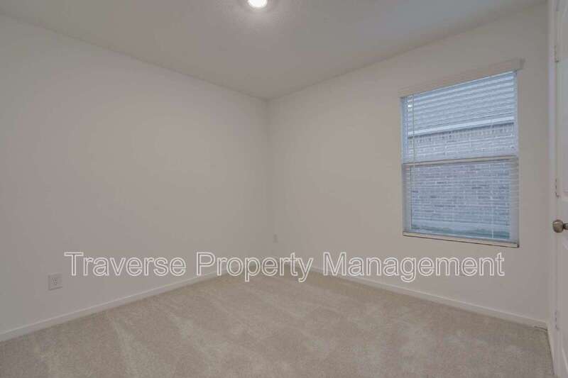 Be the first to live in this brand new 4-bedroom, 2-bathroom home in West Fort Worth! property image