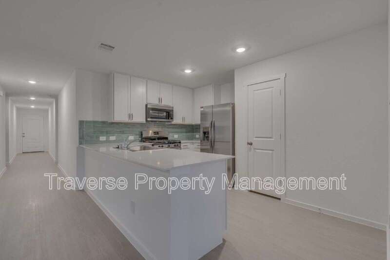 Be the first to live in this brand new 4-bedroom, 2-bathroom home in West Fort Worth! property image