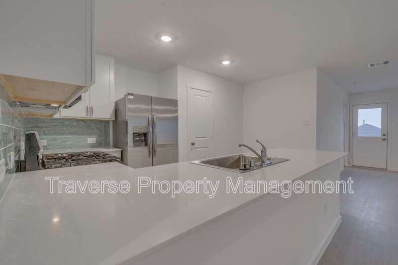 Be the first to live in this brand new 4-bedroom, 2-bathroom home in West Fort Worth! property image