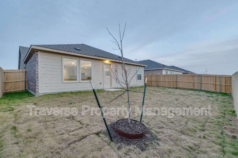 Be the first to live in this brand new 4-bedroom, 2-bathroom home in West Fort Worth! property image