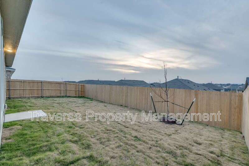 Be the first to live in this brand new 4-bedroom, 2-bathroom home in West Fort Worth! property image